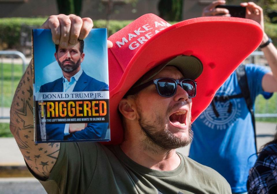 A supporter of President Trump yells at counter protesters outside a book promotion by Donald Trump Jr. at the UCLA campus in Westwood, California on November 10, 2019.