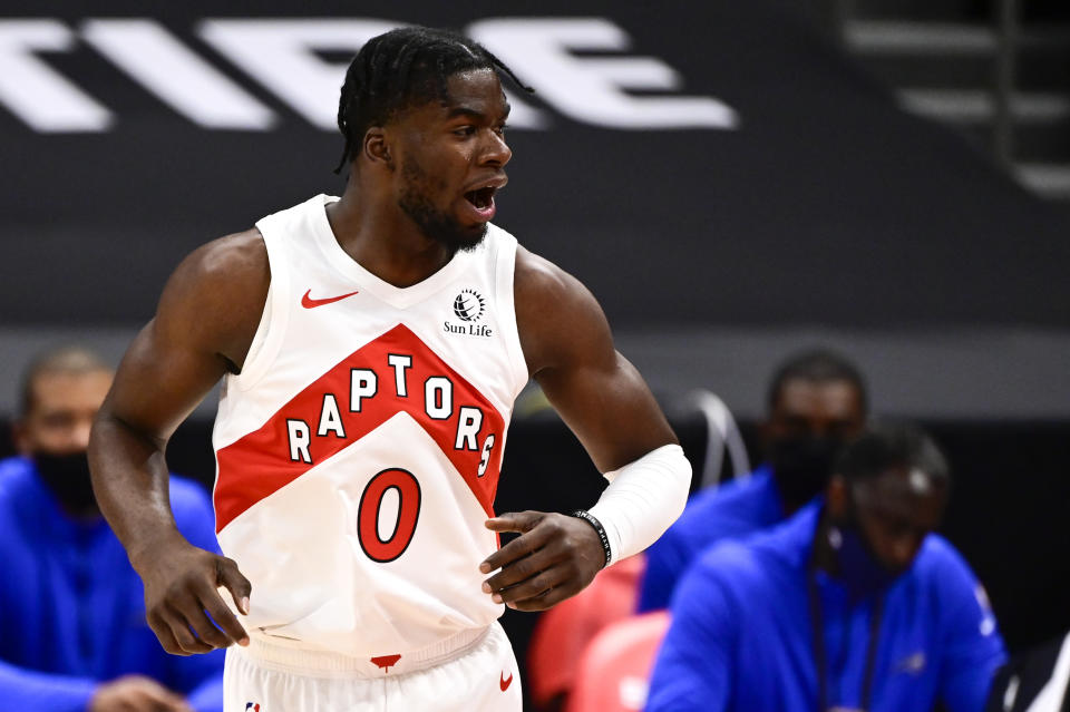 TAMPA, FLORIDA - JANUARY 31: Terence Davis #0 of the Toronto Raptors reacts during the first quarter against the Orlando Magic at Amalie Arena on January 31, 2021 in Tampa, Florida. NOTE TO USER: User expressly acknowledges and agrees that, by downloading and or using this photograph, User is consenting to the terms and conditions of the Getty Images License Agreement. (Photo by Douglas P. DeFelice/Getty Images)