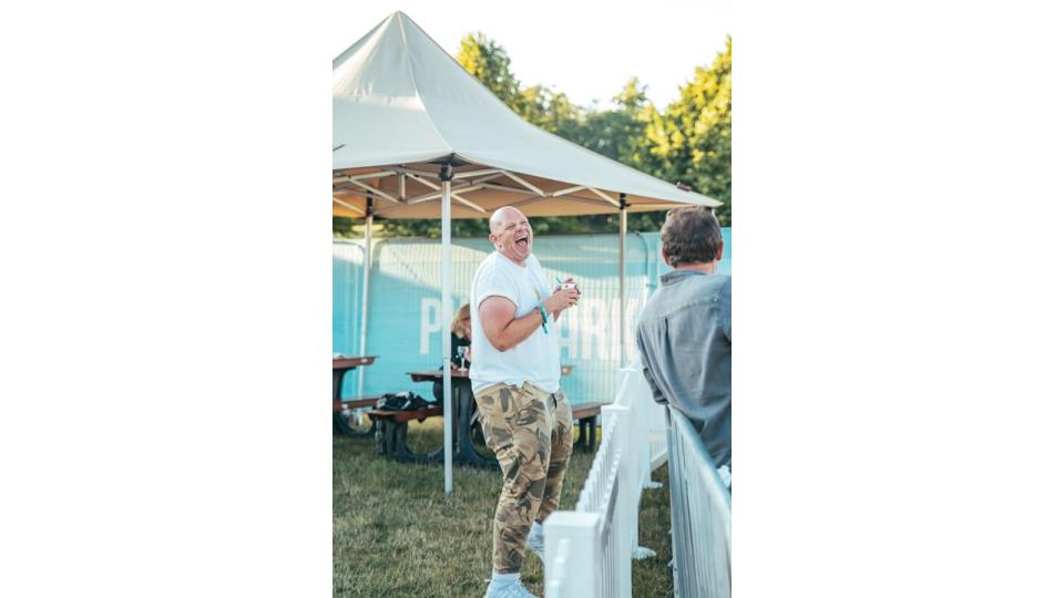 Tom Kerridge laughing in a white tee