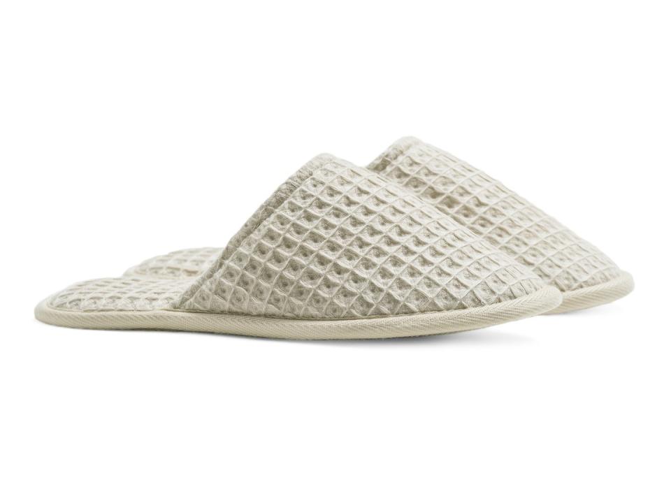 Get them at <a href="https://www.parachutehome.com/products/waffle-slippers?variant=43723862868" target="_blank">Parachute</a>.