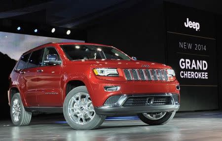 The 2014 Jeep Grand Cherokee is introduced at the North American International Auto Show in Detroit, Michigan January 14, 2013. REUTERS/James Fassinger