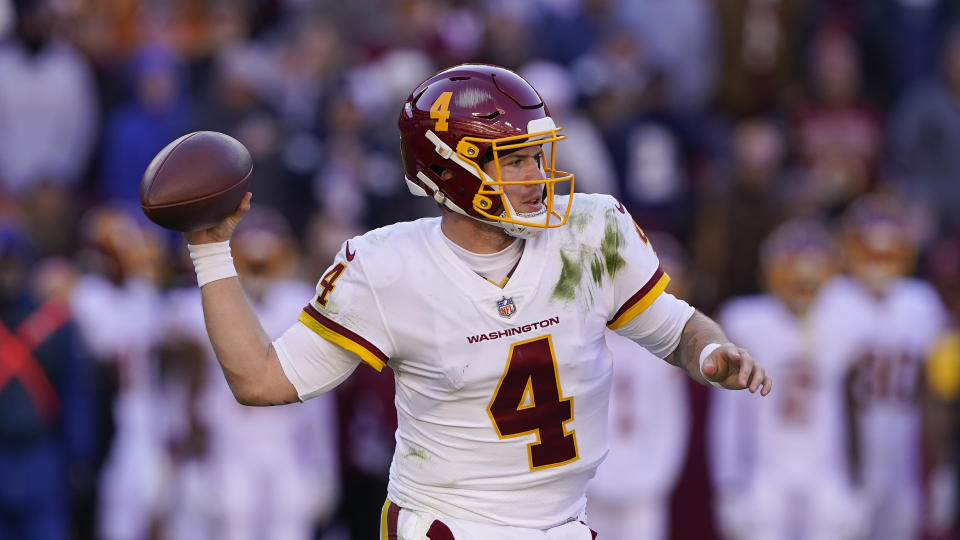 Washington Football Team quarterback Taylor Heinicke (4) during the first half of an NFL football game against the Dallas Cowboys, Sunday, Dec. 12, 2021, in Landover, Md. (AP Photo/Alex Brandon)