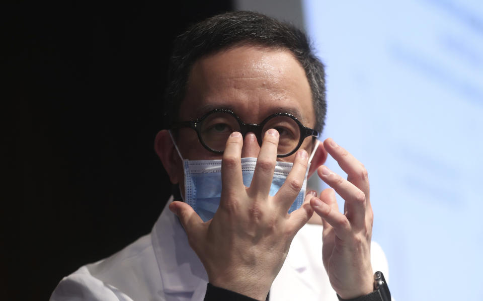 Chair Professor of public Health Medicine Gabriel Leung talks to media during a press conference in Hong Kong, Monday, Jan. 27, 2020. Hong Kong announced it would bar entry to visitors from the mainland province at the center of the outbreak. Travel agencies were ordered to cancel group tours nationwide following a warning the virus's ability to spread was increasing.(AP Photo/Achmad Ibrahim)