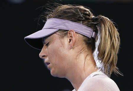 FILE PHOTO - Tennis - Australian Open - Rod Laver Arena, Melbourne, Australia, January 20, 2018. Maria Sharapova of Russia reacts during her match against Angelique Kerber of Germany. REUTERS/Thomas Peter