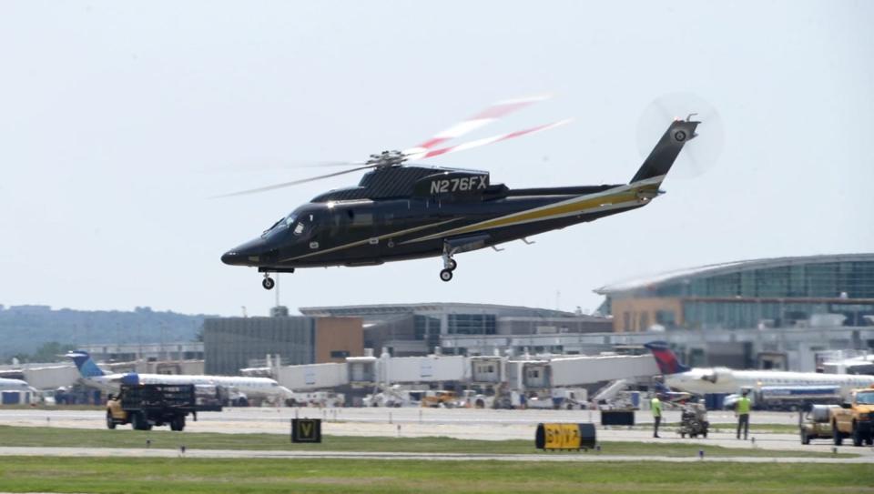 The Flexjet Sikorsky S-76 helicopter takes off from Rhode Island T.F. Green International Airport.