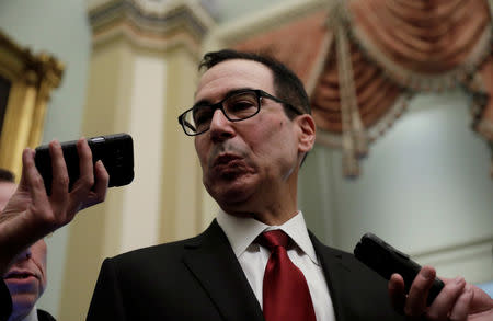 U.S. Treasury Secretary Steve Mnuchin speaks to Capitol Hill reporters after it was reported House Majority Leader Steny Hoyer (D-MD) would ask the Treasury Department to delay the lifting of sanctions on two companies tied to Russian oligarch Oleg Deripaska to give Congress time to review the decision in Washington, U.S., January 15, 2019. REUTERS/Yuri Gripas