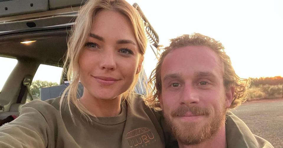 Sam Frost and Jordie Hansen smile for a selfie while travelling