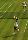 Maria Sharapova of Russia hits a shot during her match against Richel Hogenkamp of the Netherlands at the Wimbledon Tennis Championships in London, July 1, 2015. REUTERS/Henry Browne