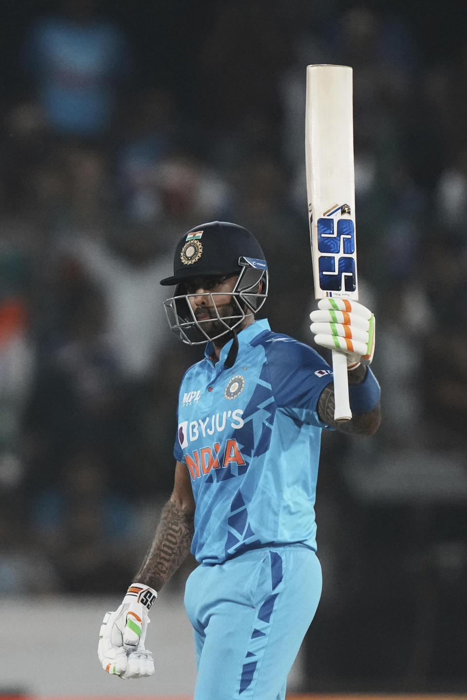 India's Suryakumar Yadav celebrates scoring fifty runs during the third T20 cricket match between India and Australia, in Hyderabad, India, Sunday, Sept. 25, 2022. (AP Photo/Mahesh Kumar A)