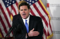 FILE - In this Dec. 2, 2020, file photo, Arizona Republican Gov. Doug Ducey answers a question during a news conference in Phoenix. A new Arizona law banning abortions after 15 weeks of pregnancy takes effect Saturday, Sept. 24, 2022 as a judge weighs a request to allow a pre-statehood law that outlaws nearly all abortions to be enforced. (AP Photo/Ross D. Franklin, Pool, File)