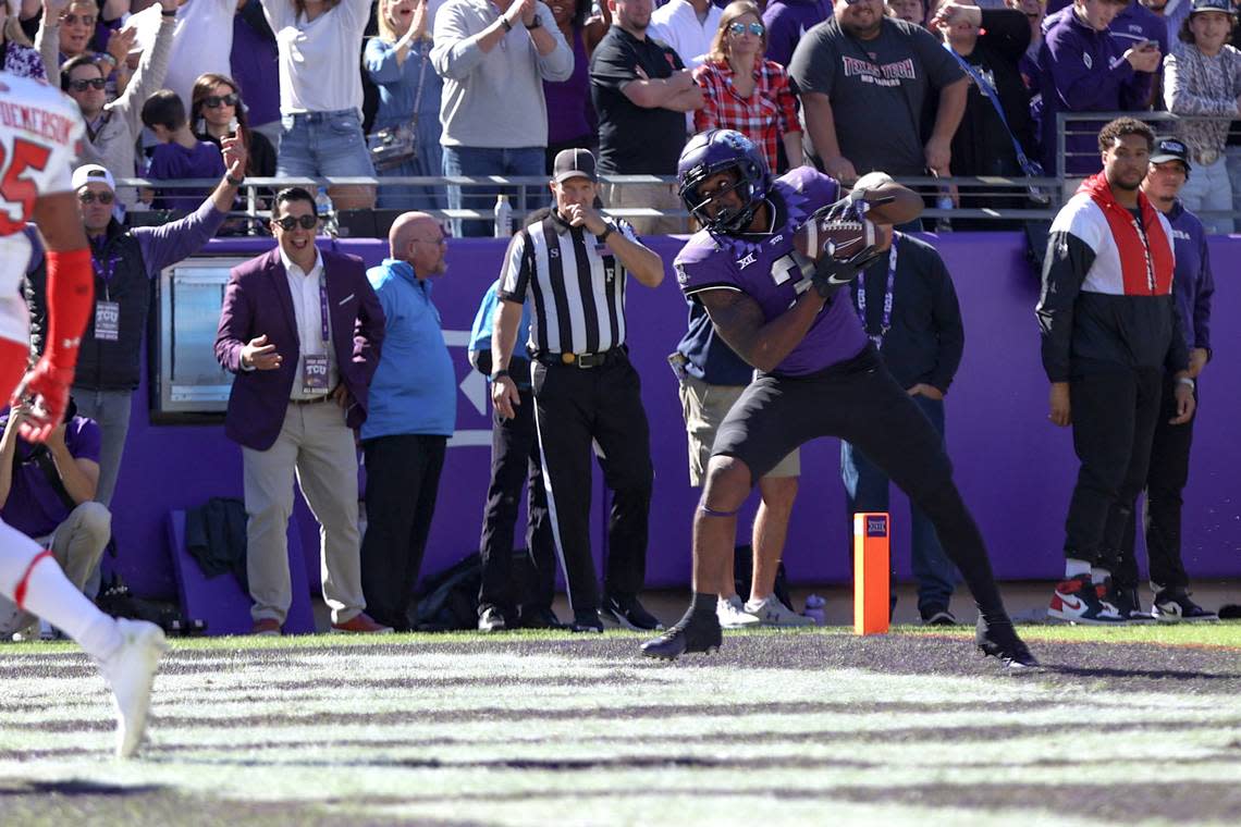 TCU wide receiver Derius Davis scores a touchdown during their game against Texas Tech on Saturday, Nov. 5, 2022, at the Amon G. Carter Stadium in Fort Worth.