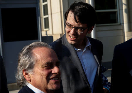 Former drug company executive Martin Shkreli (R) and his lead attorney Benjamin Brafman exit U.S. District Court following the second day of jury deliberations in his securities fraud trial in the Brooklyn borough of New York City, U.S., August 1, 2017. REUTERS/Mike Segar