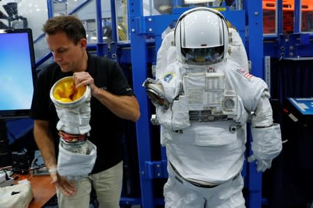 NASA Commercial Crew Astronaut Josh Cassada goes through a space suit fitting session at the Johnson Space Center in Houston,