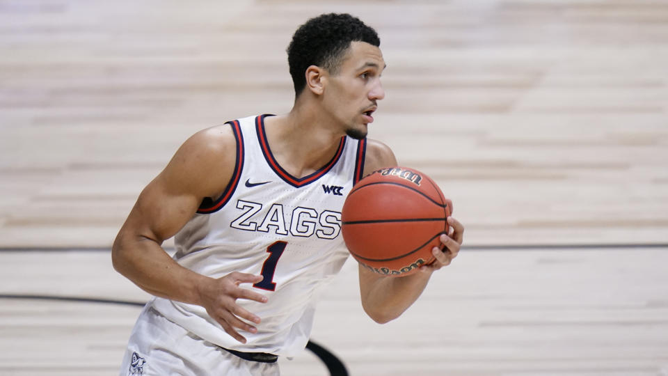 Gonzaga guard Jalen Suggs plays against Creighton in the first half of a Sweet 16 game in the NCAA men's college basketball tournament at Hinkle Fieldhouse in Indianapolis, Sunday, March 28, 2021. (AP Photo/AJ Mast)