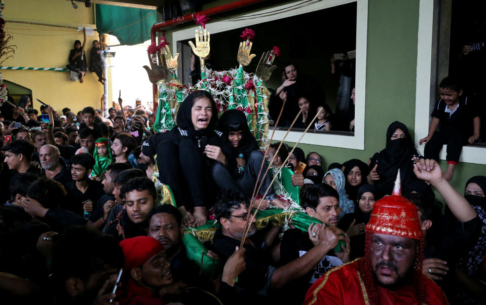 <p>Shi’ite Muslims take part in a Muharram procession to mark Ashura, in Mumbai, India, September 21, 2018. REUTERS/Francis Mascarenhas </p>