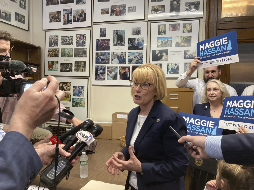 FILE - Sen. Maggie Hassan, D-N.H., speaks to reporters after signing papers to file for reelection June 10, 2022, at the Secretary of State's office in Concord, N.H. (AP Photo/Kathy McCormack, File)