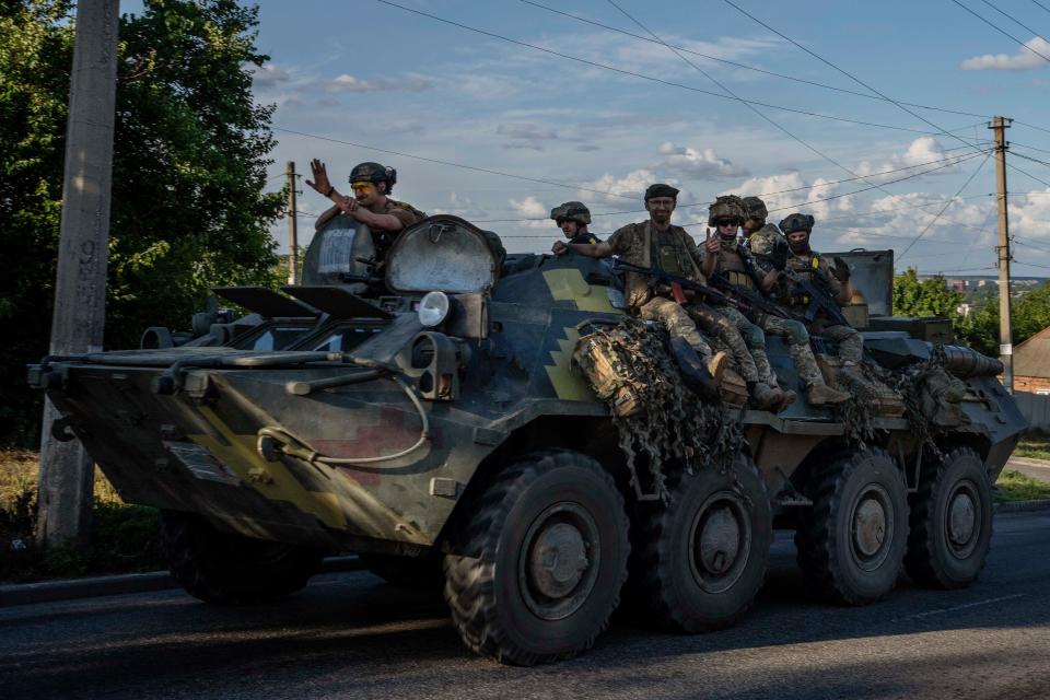 Ukrainian soldiers ride a tank, on a road in Donetsk region, eastern Ukraine, Wednesday, July 20, 2022. Russian Foreign Minister Sergey Lavrov told state-controlled RT television and the RIA Novosti news agency that Russia has expanded its "special military operation" to include the Kherson and Zaporizhzhia regions and other captured territories.