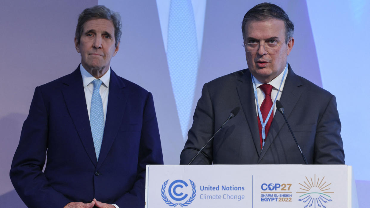 U.S. climate envoy John Kerry and Mexican Foreign Minister Marcelo Ebrard hold a press conference at the COP27 climate conference in the Egyptian Red Sea resort of Sharm el-Sheikh.