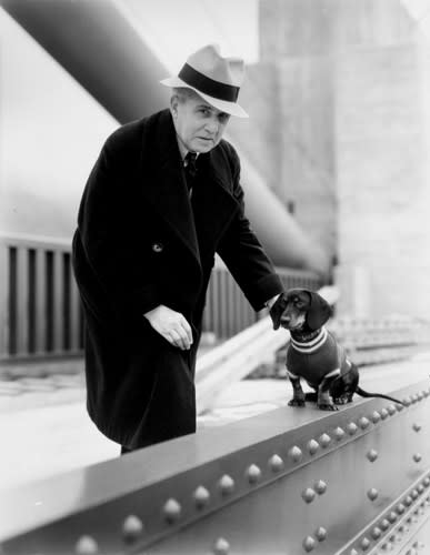 Joseph Strauss with a dog. From the holdings of the Golden Gate Bridge, Highway and Transportation District, Used with Permission, www.goldengate.org