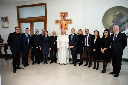 Microsoft President and Chief Legal Officer Brad Smith meets with Pope Francis at Saint Martha's House at the Vatican, February 13, 2019. Vatican Media/Handout via REUTERS