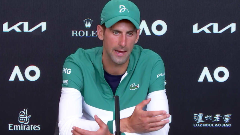 Novak Djokovic (pictured) discussing quarantine with reporters at a press conference.