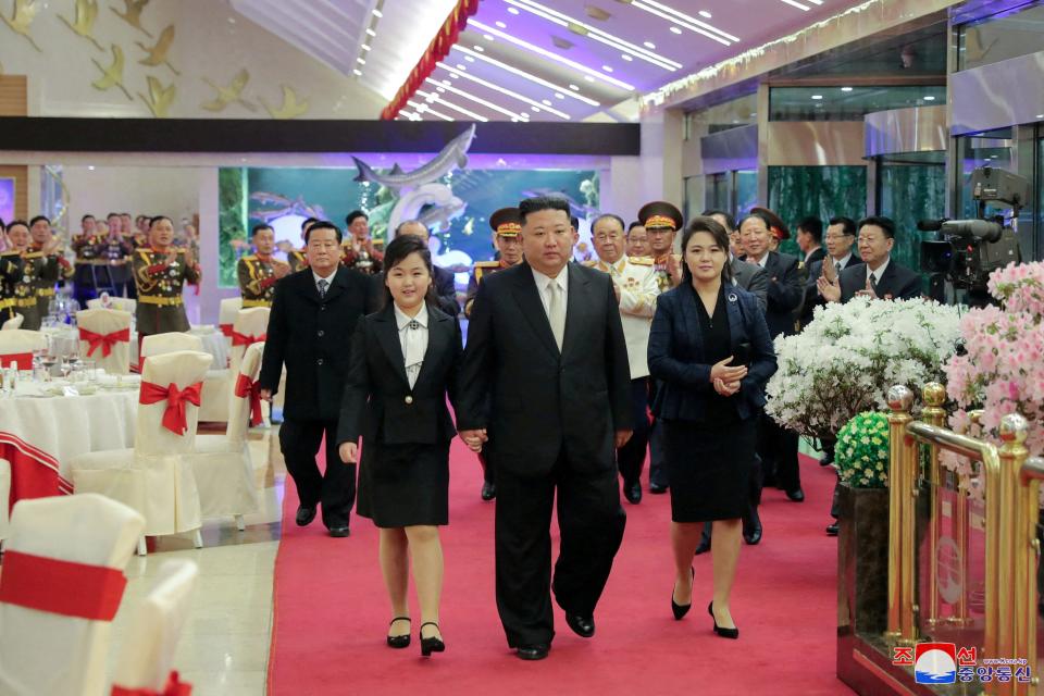 North Korean leader Kim Jong Un walks with his daughter Kim Ju Ae and his wife Ri Sol Ju while attending a banquet to celebrate the 75th anniversary of the Korean People's Army the following day, in Pyongyang, North Korea February 7, 2023