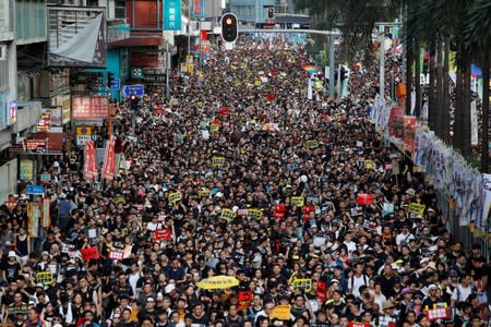 Anti-extradition bill protesters march during the anniversary of Hong Kong's handover to China in Hong Kong