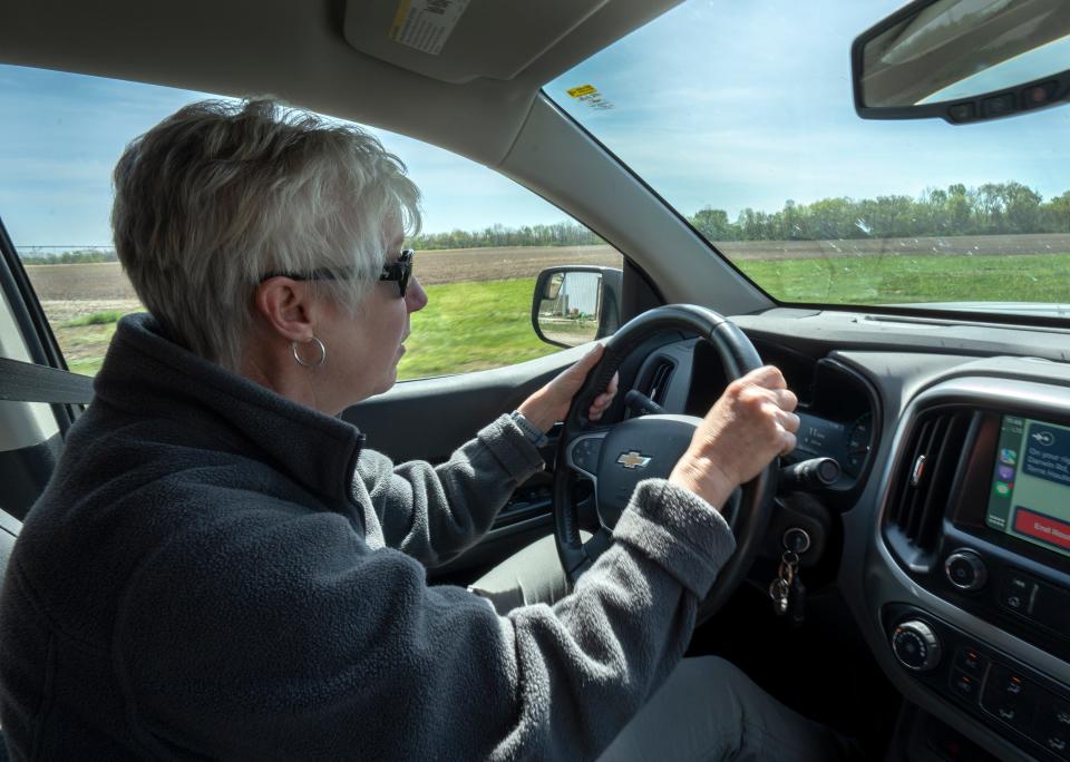 Betsy Bower, an agronomist for Ceres Solutions Cooperative, drives to a farmer’s recently planted corn and soybean fields to check on crop emergence.