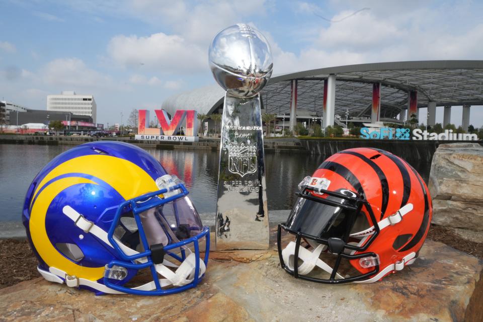 Los Angeles Rams and Cincinnati Bengals helmets are seen with a Vince Lombardi Trophy at SoFi Stadium.