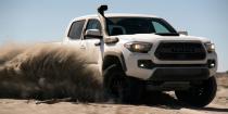<p>Toyota gave its entire <a href="https://www.roadandtrack.com/new-cars/future-cars/a16757034/2019-toyota-tacoma-trd-pro-tundra-4runner/" rel="nofollow noopener" target="_blank" data-ylk="slk:TRD Pro line;elm:context_link;itc:0;sec:content-canvas" class="link ">TRD Pro line</a> Fox Racing shocks for 2019, making them incredibly capable for all kinds of off-road adventures. The Tacoma remains the coolest of the bunch, and can now be optioned with a sweet A-pillar mounted snorkel. <a href="https://www.ebay.com/itm/2019-Toyota-Tacoma-TRD-Pro/233574138814?hash=item36621a83be:g:GEAAAOSwjKNegwlk" rel="nofollow noopener" target="_blank" data-ylk="slk:This one's;elm:context_link;itc:0;sec:content-canvas" class="link ">This one's</a> barely been broken-in, and it's for sale. </p>