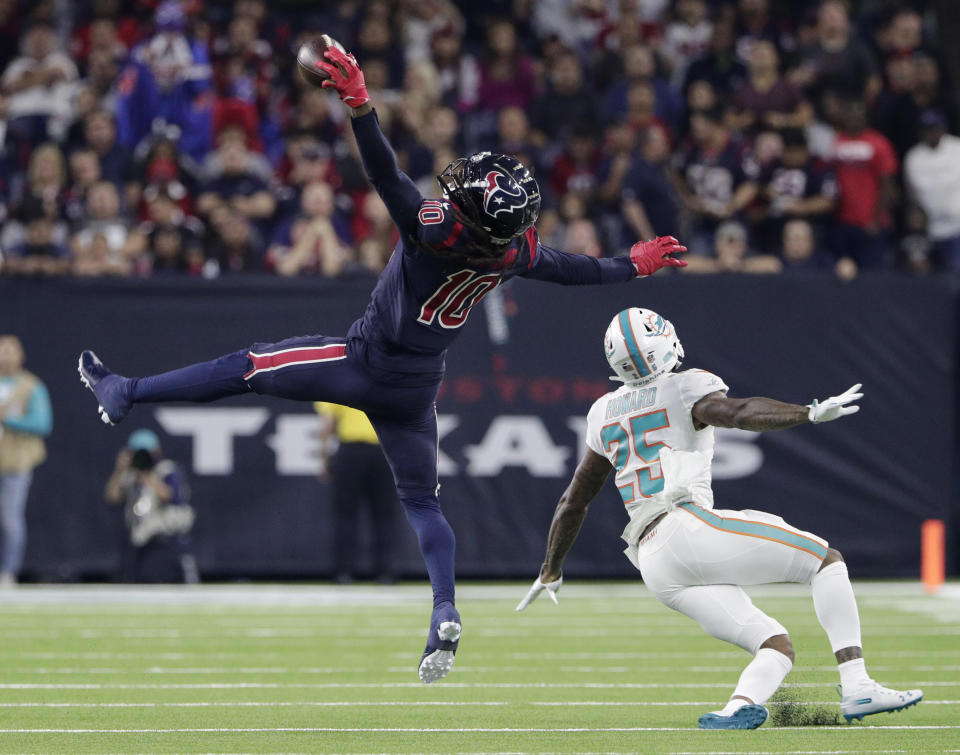 Houston wide receiver DeAndre Hopkins made a jaw-dropping catch against Miami, although the play didn’t stand because of a penalty. (AP)