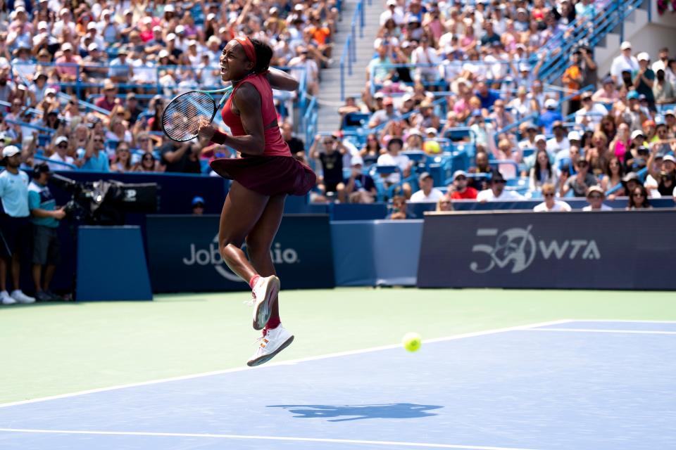 Coco Gauff, of the United States, celebrates after defeating Iga Świątek, of Poland, in their semifinal match at the Western & Southern Open at the Lindner Family Tennis Center in Mason, Ohio, on Saturday, Aug.19, 2023. Gauff won 7-6, 3-6, 6-4.