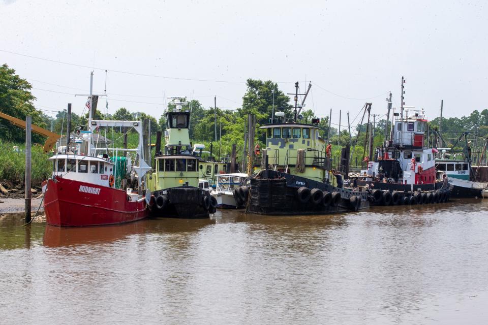 Fishing boats and tug boats docked at the Belford Seafood Co-Op in the Belford section of Middletown, NJ Wednesday, July 7, 2021. 