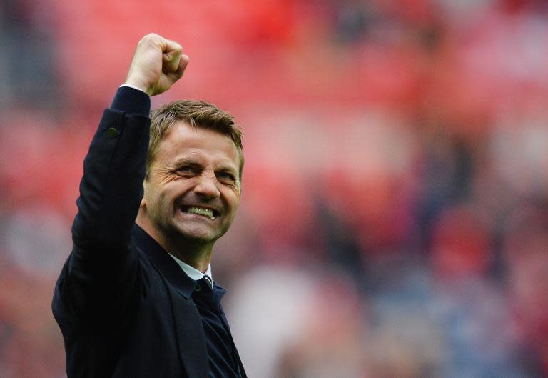 Aston Villa's manager Tim Sherwood celebrates winning the FA Cup semi-final against Liverpool on April 19, 2015