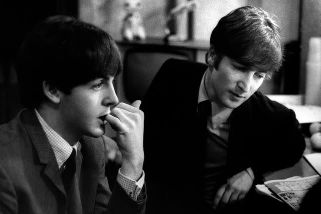 <p>Val Wilmer/Redferns</p> Paul McCartney and John Lennon in 1963