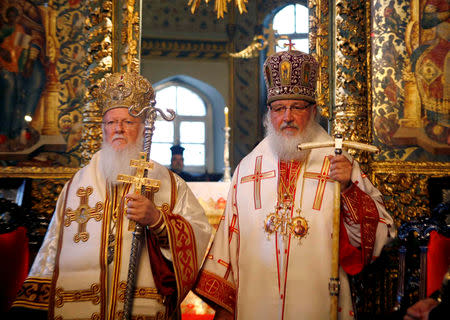 FILE PHOTO: Ecumenical Greek Orthodox Patriarch Bartholomew I and Russian Orthodox Patriarch Kirill conduct Sunday service in the Patriarchal Cathedral of St. George at the Ecumenical Orthodox Patriarchate in Istanbul, Turkey July 5, 2009. REUTERS/Osman Orsal/File Photo