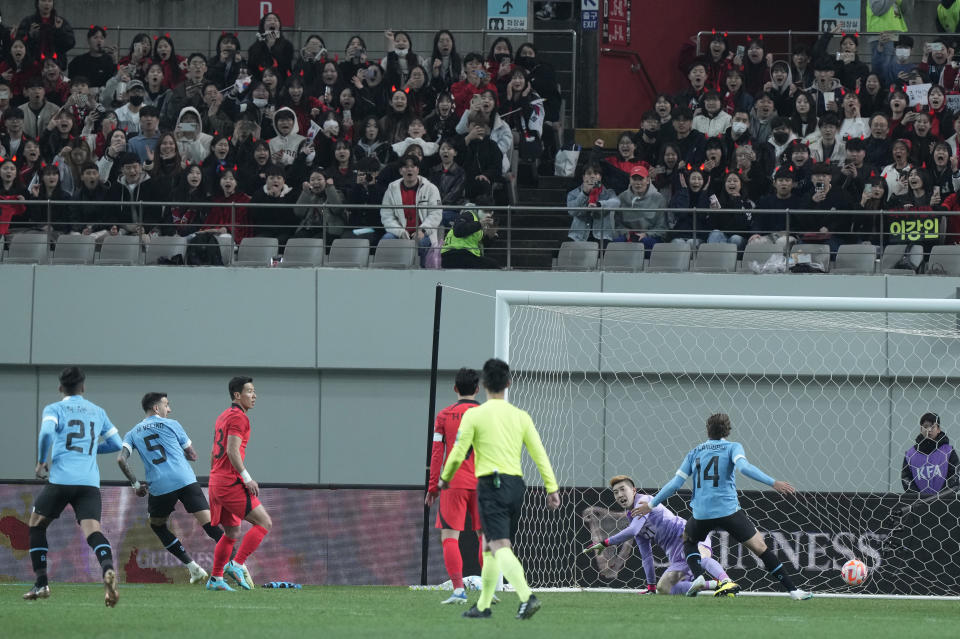 Uruguay's Matias Vecino Falero, second left, scores a goal during an international friendly soccer match between South Korea and Uruguay in Seoul, Sough Korea, Tuesday, March 28, 2023. (AP Photo/Ahn Young-joon)