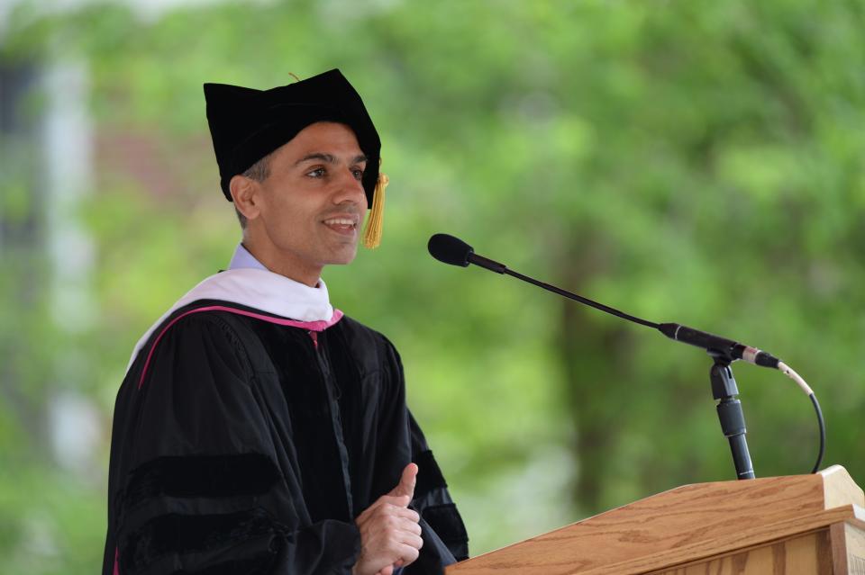 Morningstar Inc. CEO Kunal Kapoor, a 1997 Monmouth College graduate, addresses members of the Class of 2022 on Sunday afternoon on the College's Wallace Hall Plaza.
