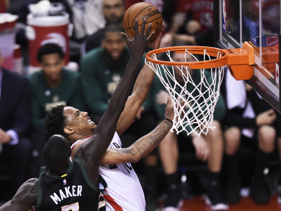 Toronto Raptors guard DeMar DeRozan (10) is blocked by Milwaukee Bucks forward Thon Maker (7) during second-half NBA playoff basketball game action in Toronto, Saturday, April 15, 2017. (Nathan Denette/The Canadian Press via AP)