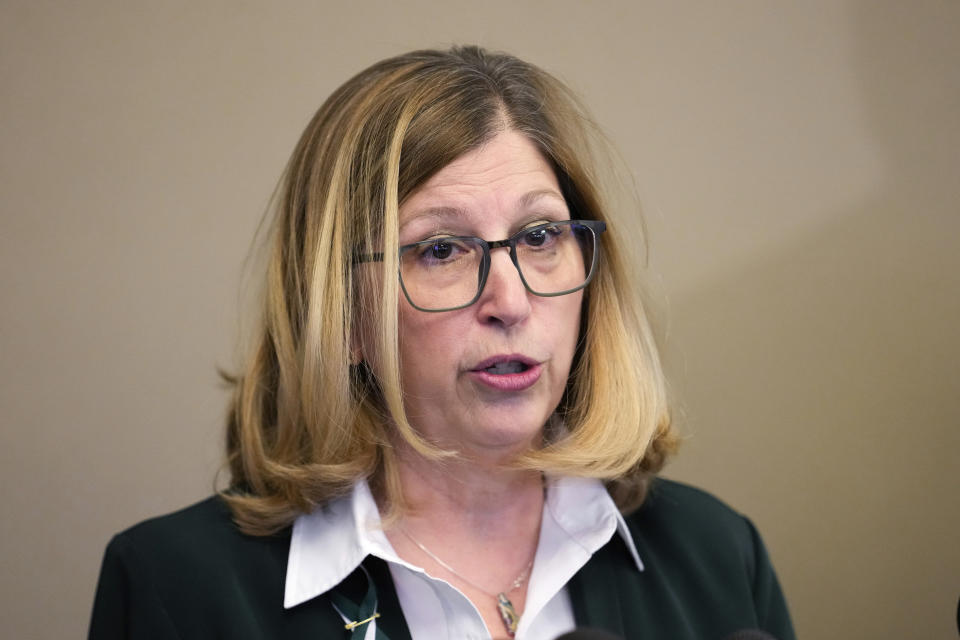 Teresa K. Woodruff, Michigan State University interim President speaks during a news conference at Michigan State University in East Lansing, Mich., Thursday, Feb. 16, 2023. Alexandria Verner, Brian Fraser and Arielle Anderson were killed and several other students remain in critical condition after a gunman opened fire on the campus of Michigan State University Monday night. (AP Photo/Paul Sancya)