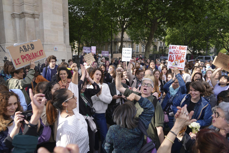 Women gather for an protest organized by a feminist association called the Observatory on Sexual and Gender-based violence in politics, Tuesday, May 24, 2022 in Paris. Rape accusations against a newly named French government minister have galvanized a movement aimed at exposing sexual misconduct in French politics and encouraging women to speak out against abusers. (AP Photo/Nicolas Garriga)