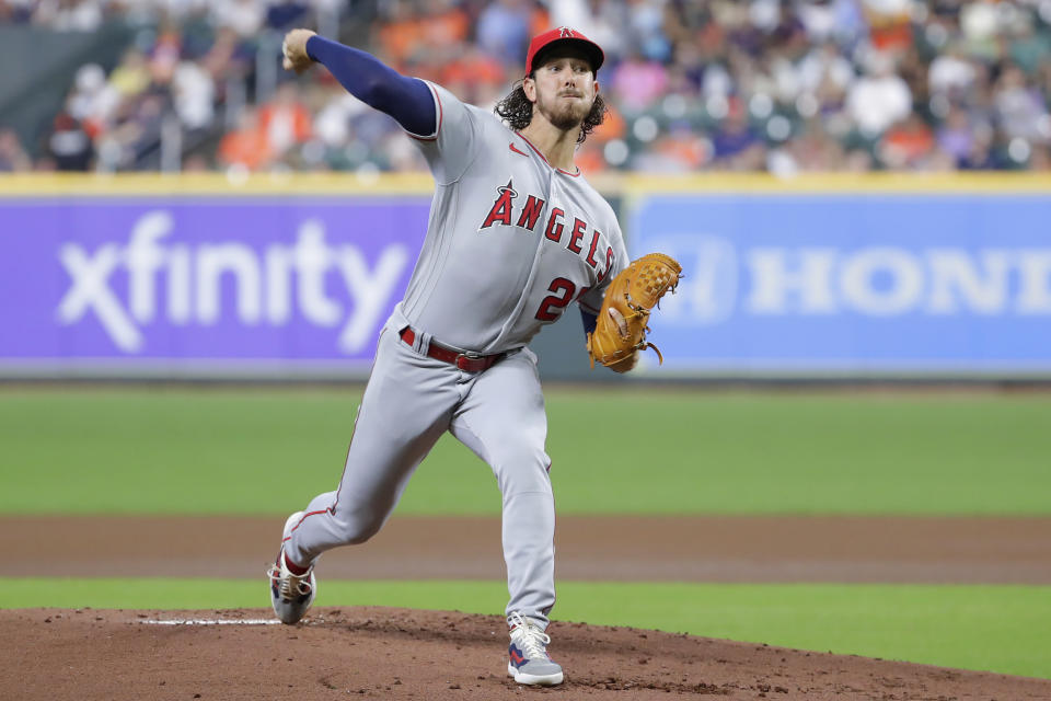 Los Angeles Angels starting pitcher Michael Lorenzen throws to a Houston Astros batter during the first inning of a baseball game Friday, Sept. 9, 2022, in Houston. (AP Photo/Michael Wyke)