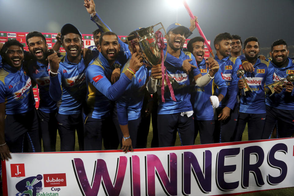 Sri Lankan players celebrate their victory against Pakistan in the final of Twenty20 at the Gaddafi Stadium in Lahore, Pakistan, Wednesday, Oct. 9, 2019. A second-string Sri Lanka team whitewashed top-ranked Pakistan 3-0 by registering 13-run victory in the third and final Twenty20 on Wednesday. (AP Photo/K.M. Chaudary)