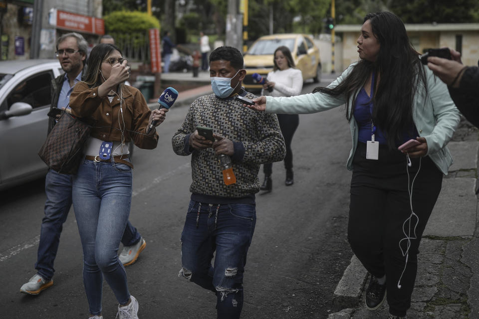 Manuel Ranoque, the father of two of the youngest Indigenous children who survived an Amazon plane crash that killed three adults, and then braved the jungle for 40 days before being found alive, speaks to the media from the entrance of the military hospital where the children are receiving medical attention, in Bogota, Colombia, Sunday, June 11, 2023. (AP Photo/Ivan Valencia)