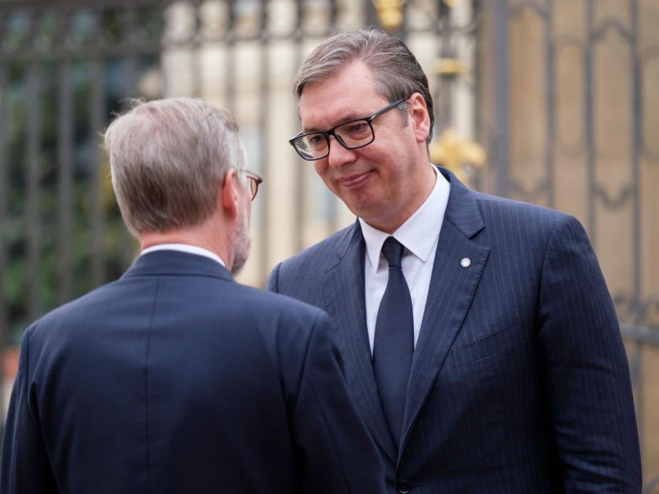 PRAGUE, CZECH REPUBLIC - OCTOBER 6: Czech Prime Minister, President of the Council Petr Fiala (L) welcomes the President of Serbia Aleksandar Vucic (R) at the arrival of the first European Political Community meeting in Prague Castel on October 6, 2022 in Prague, Czech Republic. The European Political Community is an intergovernmental cooperation organization project, launched on the initiative of Emmanuel Macron during the French presidency of the Council of the European Union in 2022, in the context of the invasion of Ukraine by the Russia in 2022. The project aims to foster political dialogue and cooperation to address issues of common interest, so as to strengthen the security, stability and prosperity of the European continent; while allowing better support for candidates for membership. The challenge is to be able to stabilize European borders at a distance from the EU and to renew a relationship with countries such as Turkey, Ukraine and the United Kingdom. (Photo by Thierry Monasse/Getty Images)