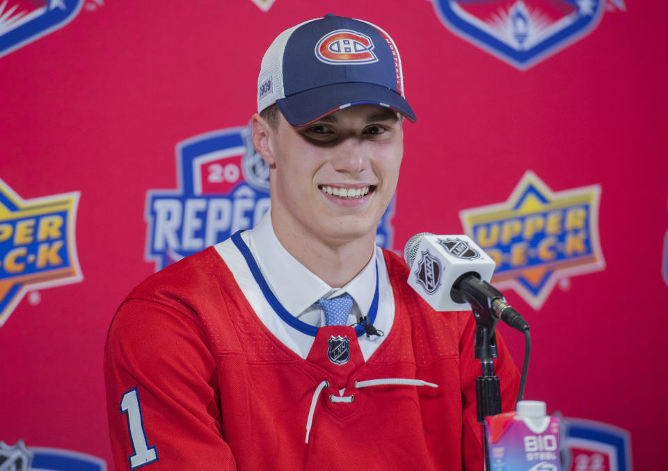 Juraj Slafkovsky smiles during a news conference after being selected as the first overall pick by the Montreal Canadiens during the NHL hockey draft in Montreal on Thursday, July 7, 2022. (Ryan Remiorz/The Canadian Press via AP)