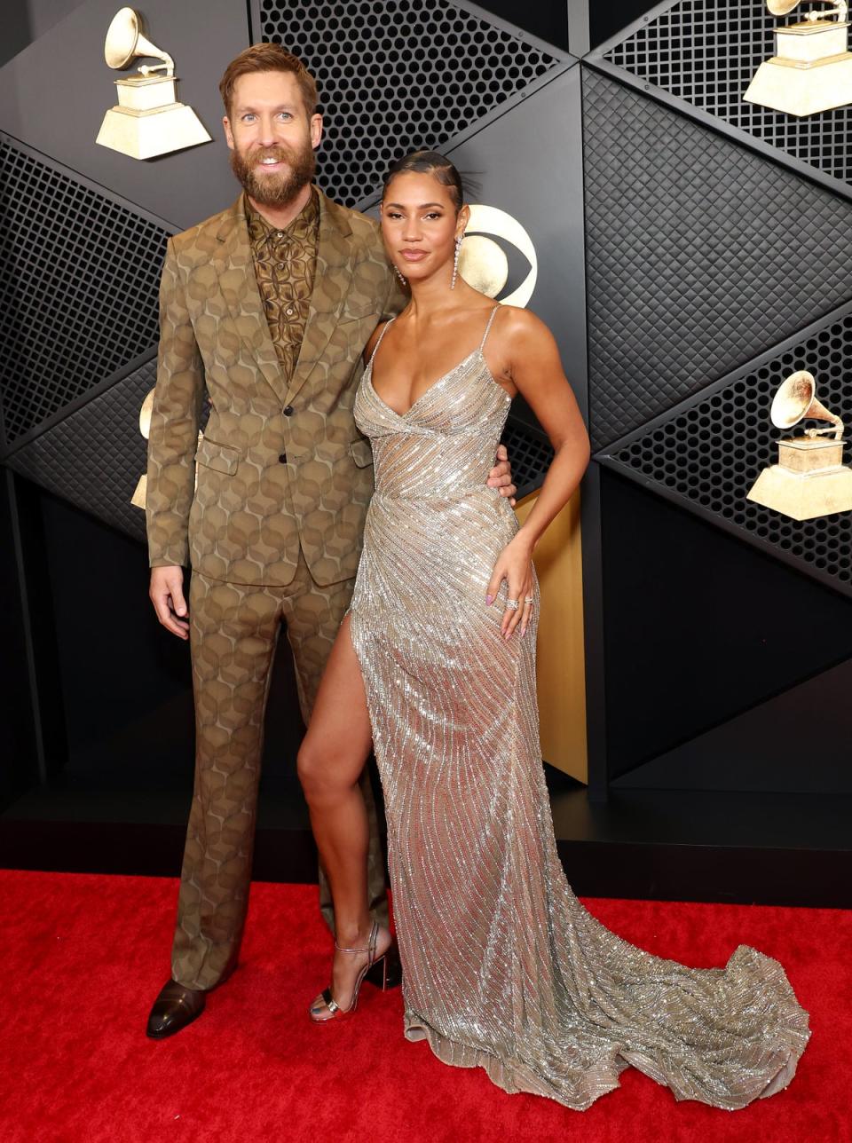 Calvin Harris and Vick Hope wearing Kyiha Studios (Getty Images)