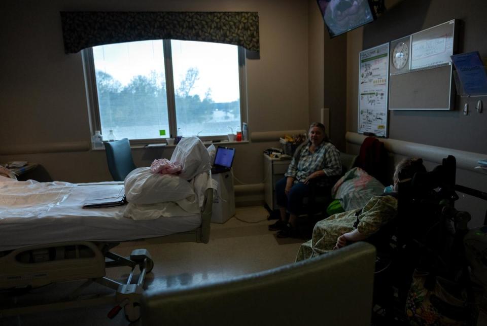 Kaitlyn Cunningham and her mother Kathy Cunningham sit in Kaitlyn’s hospital room at Cedar Park Regional Medical Center in Cedar Park, Texas on Mar. 13, 2024. The two were living in this space for more than two months together.