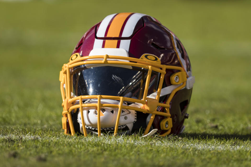 LANDOVER, MD - DECEMBER 15: A Washington Redskins helmet is seen on the field before the game between the Washington Redskins and the Philadelphia Eagles at FedExField on December 15, 2019 in Landover, Maryland. (Photo by Scott Taetsch/Getty Images)