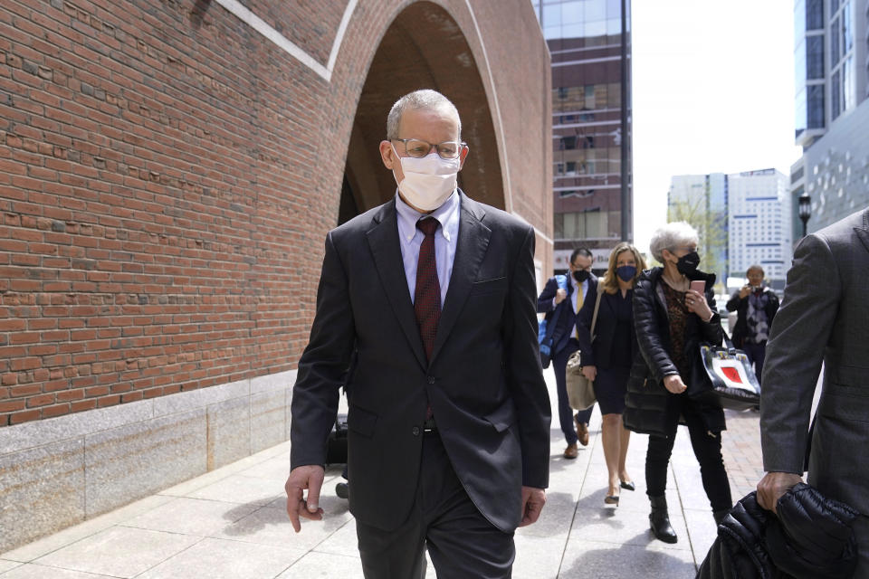Charles Lieber departs federal court in Boston, Wednesday, April 26, 2023. Lieber, a former Harvard University professor convicted of lying to federal investigators about his ties to a Chinese-run science recruitment program and failing to pay taxes on payments from a Chinese university, was sentenced Wednesday to supervised release and ordered to pay more than $83,000 in restitution and fines. (AP Photo/Steven Senne)